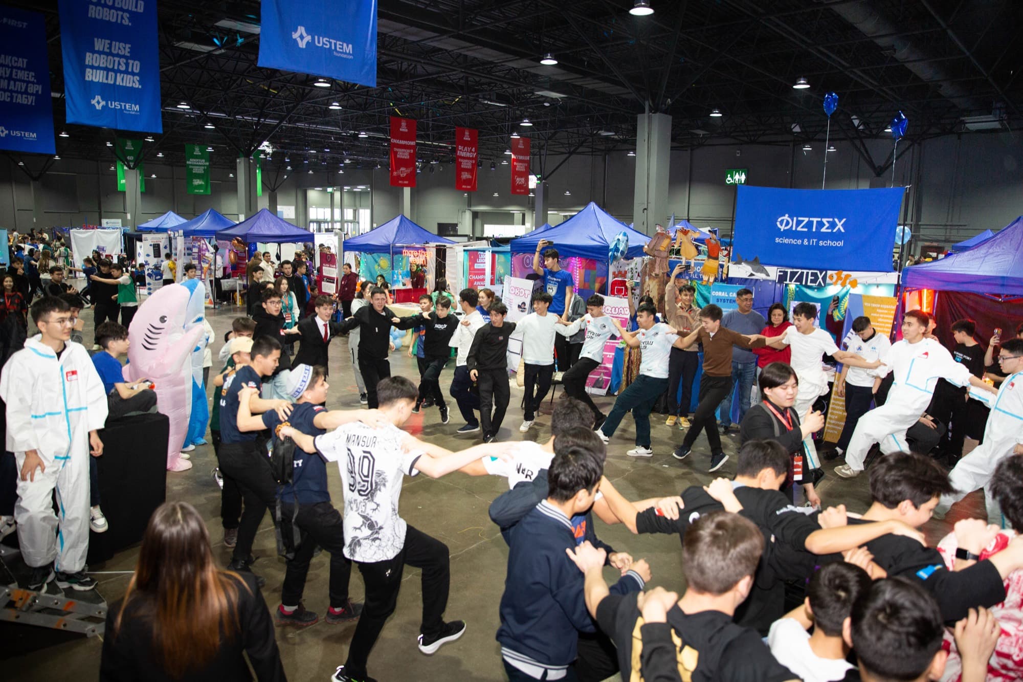 Participants celebrating at a previous Almaty Tech Cup